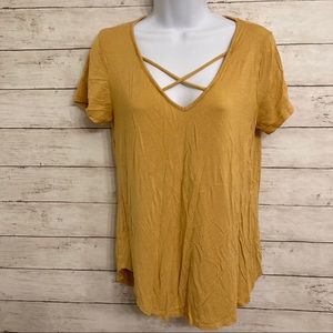 ⭐️ flowy yellow top with criss cross
